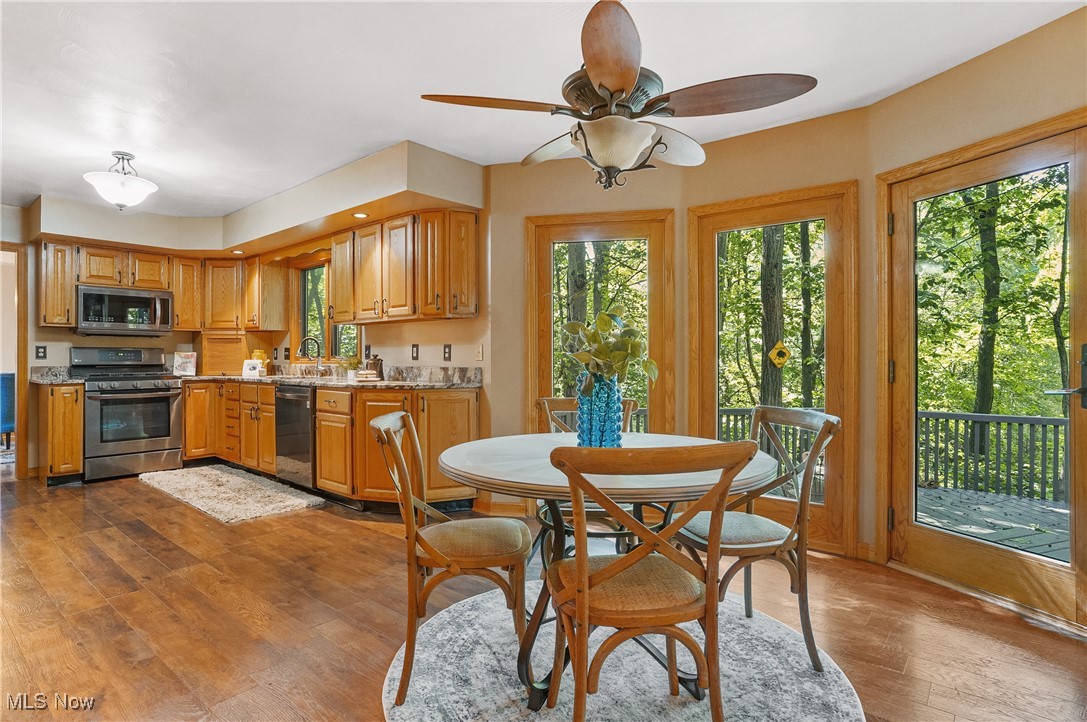 370 Wilcox Road Youngstown, OH 44515 - Photo 11 of 49 Dining area featuring hardwood / wood-style floors and ceiling fan