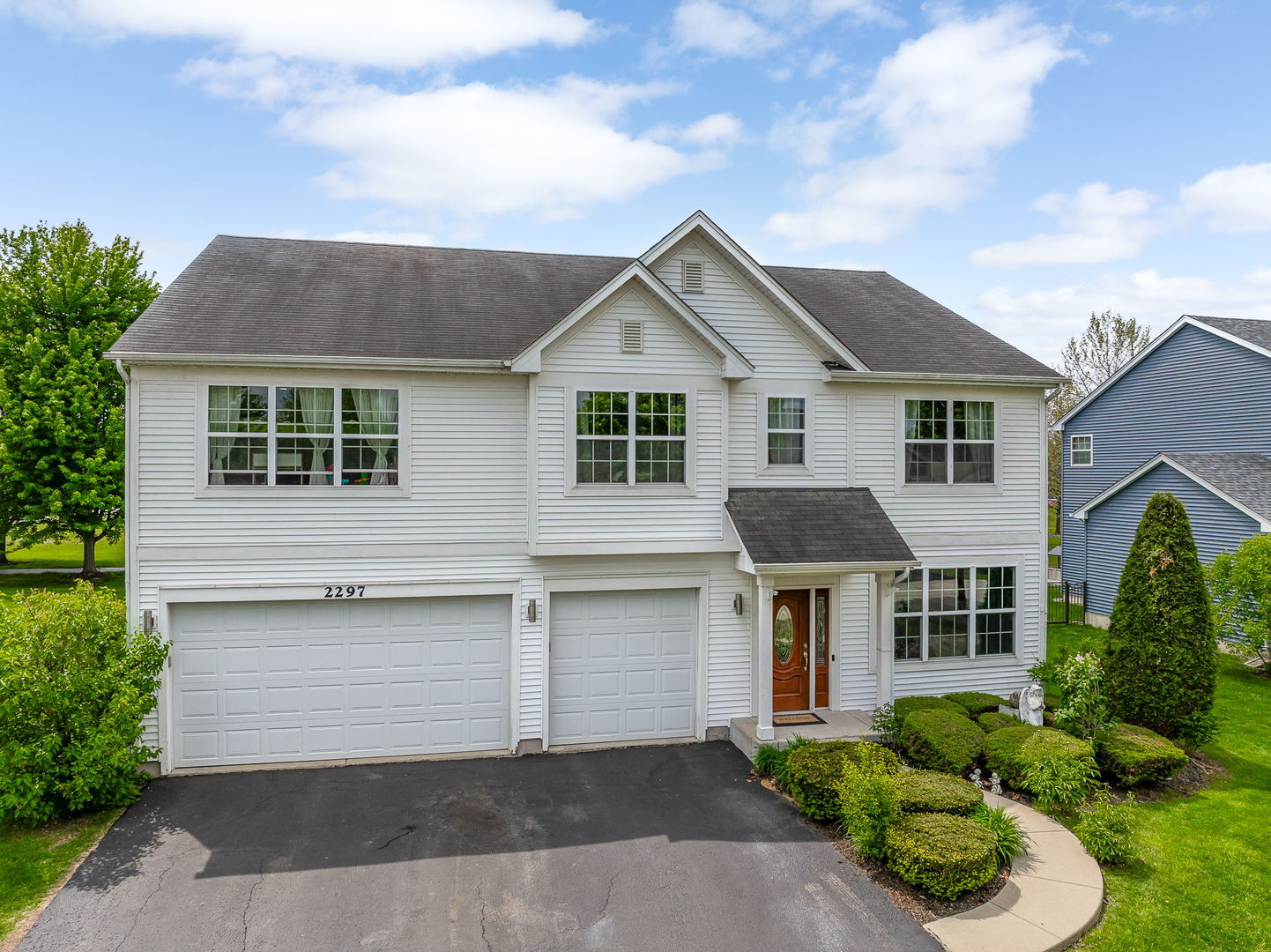 2297 Deerpath Road Bolingbrook, IL 60490 - Photo 2 of 46 front view of a house with a yard