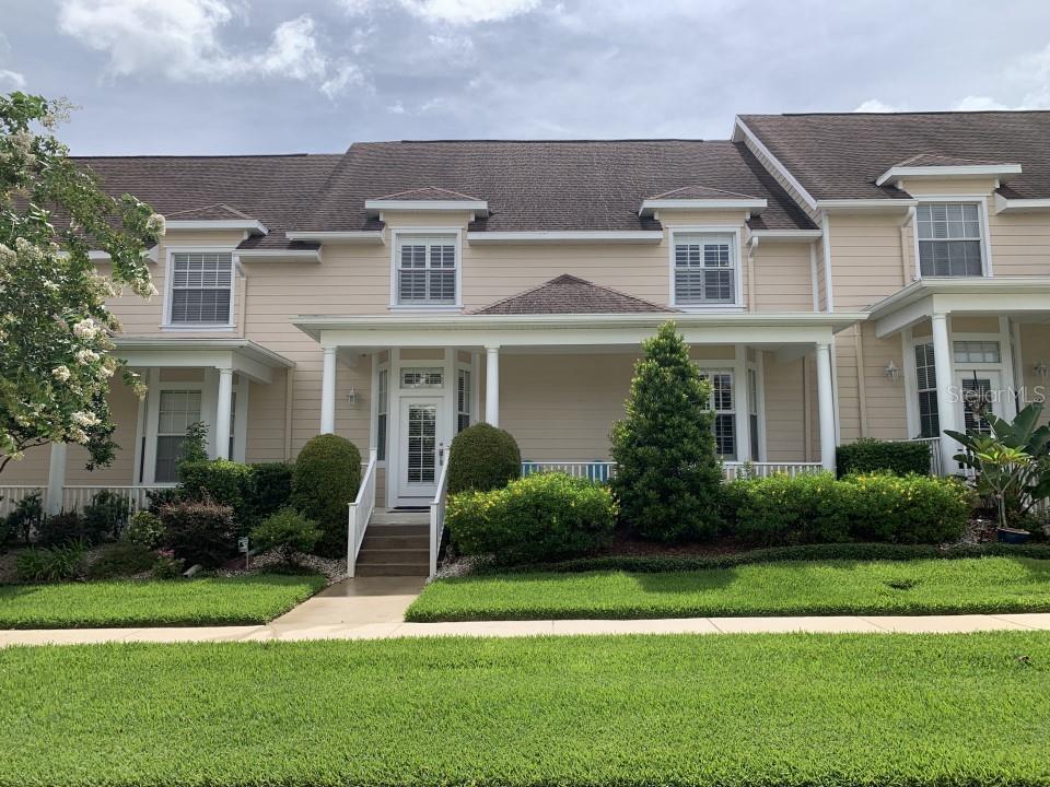 152 Riggings Way Clermont, FL 34711 - Photo 1 of 1 a front view of house with yard and green space