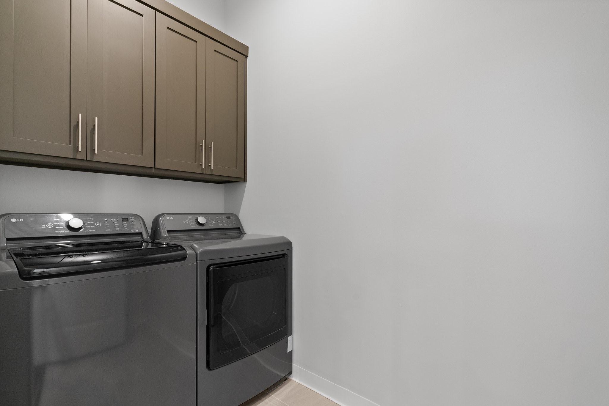 7217 Blessing Avenue, Unit A Austin, TX 78752 - Photo 16 of 22 First Floor Laundry Room with washer & dryer
