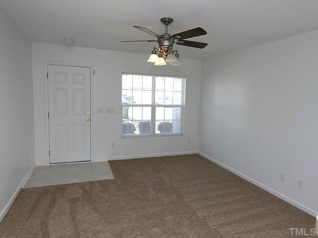 3734 Marshlane Way Raleigh, NC 27610 - Photo 3 of 12 a view of an empty room with a window