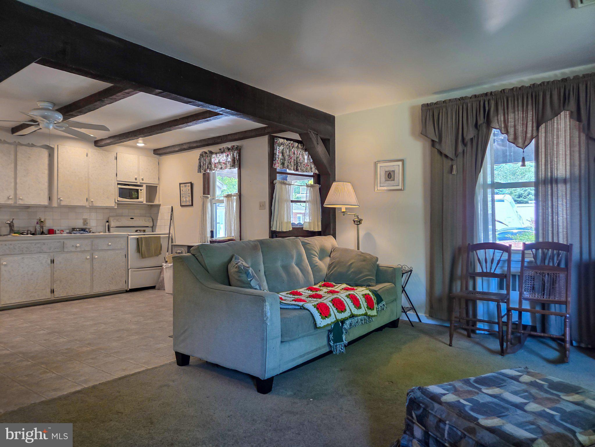 524 Locust Street Denver, PA 17517 - Photo 11 of 36 Cozy living space with rustic charm.