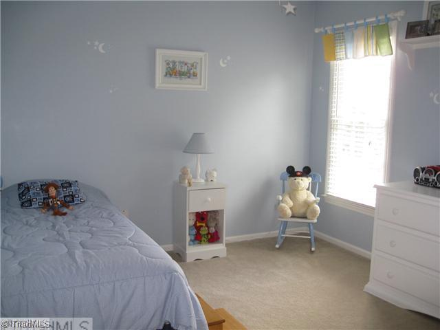 4225 Braddock Road High Point, NC 27265 - Photo 10 of 16 2nd Bedroom. This bedroom offers a nice size closet, 2" blinds, and ceiling fan.
