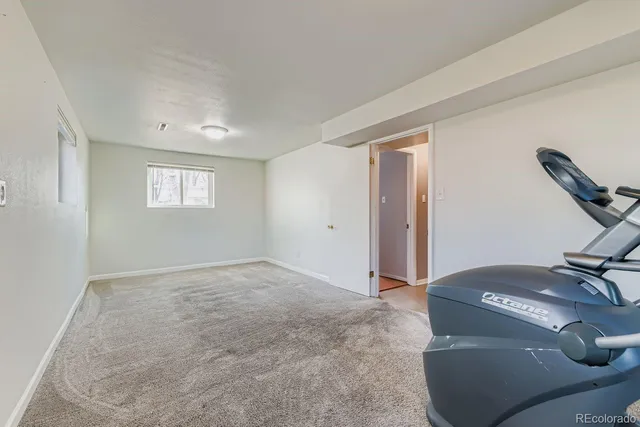a view of livingroom with workspace