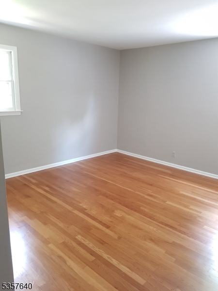 67 Canfield Road Morristown, NJ 07960 - Photo 19 of 21 a view of empty room with wooden floor