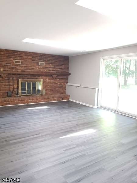 67 Canfield Road Morristown, NJ 07960 - Photo 21 of 21 an empty room with wooden floor