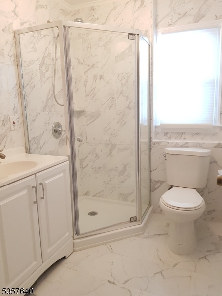 67 Canfield Road Morristown, NJ 07960 - Photo 8 of 21 a bathroom with a shower a toilet and a sink