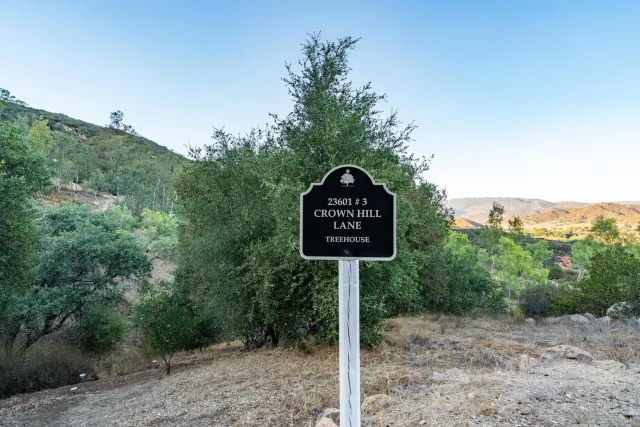 a sign board with a park