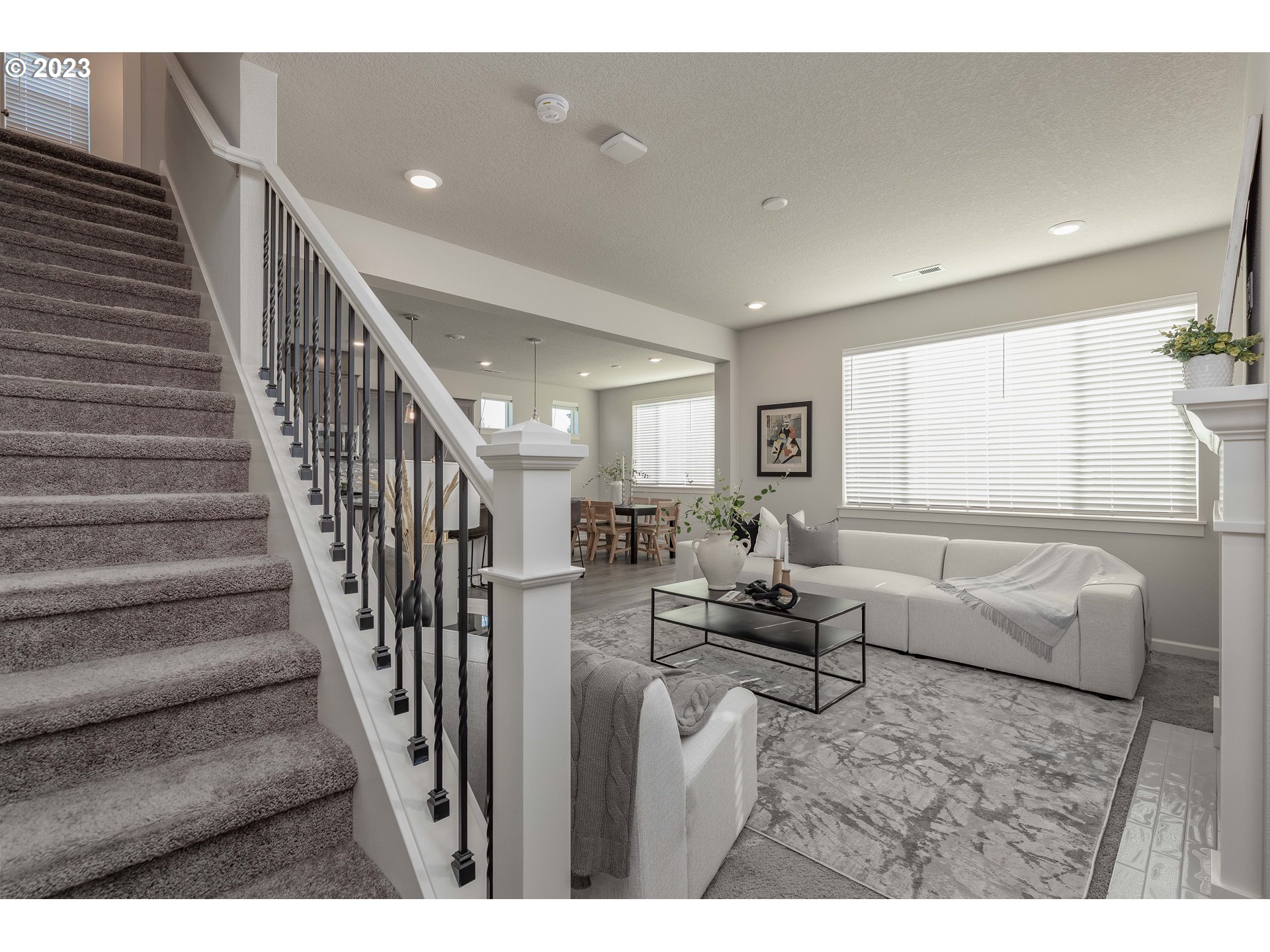 3825 South 39th Place Ridgefield, WA 98642 - Photo 11 of 37 a living room with furniture and wooden floor