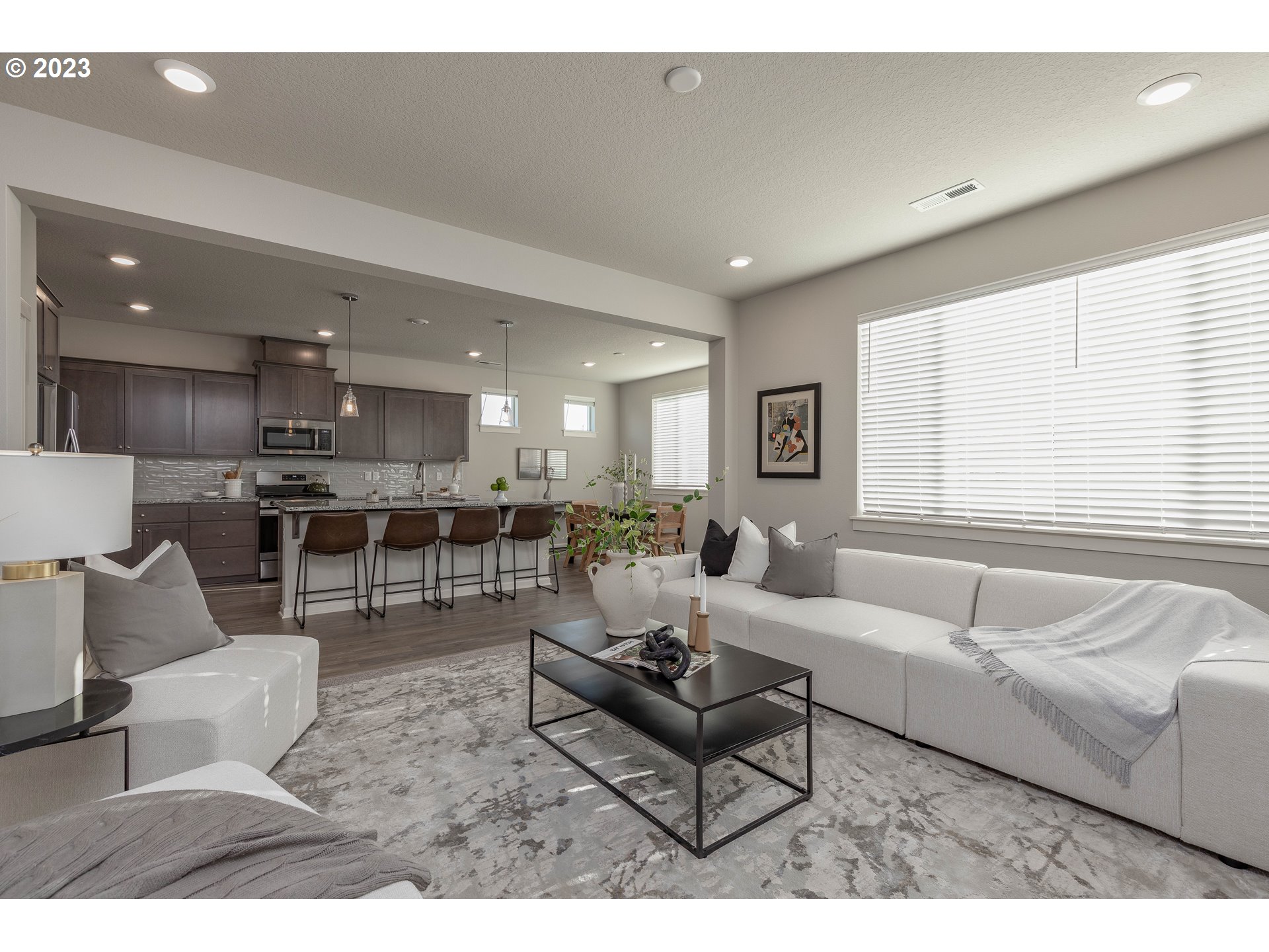 3825 South 39th Place Ridgefield, WA 98642 - Photo 12 of 37 a living room with furniture and a large window