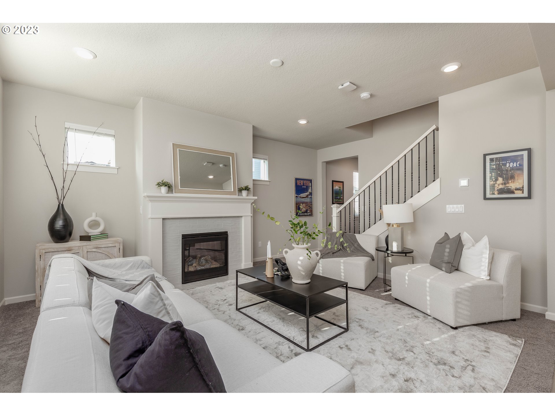 3825 South 39th Place Ridgefield, WA 98642 - Photo 13 of 37 a living room with furniture and a fireplace