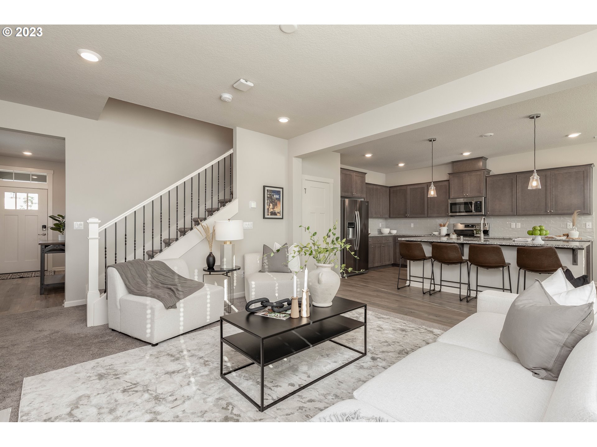 3825 South 39th Place Ridgefield, WA 98642 - Photo 14 of 37 a living room with furniture and kitchen view