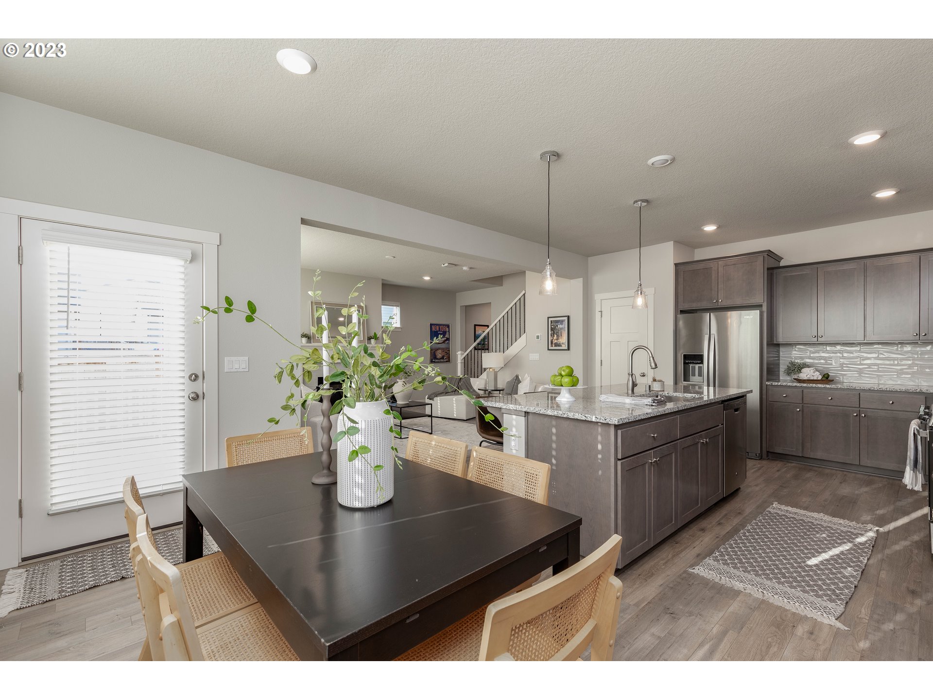 3825 South 39th Place Ridgefield, WA 98642 - Photo 17 of 37 a kitchen with a table and chairs