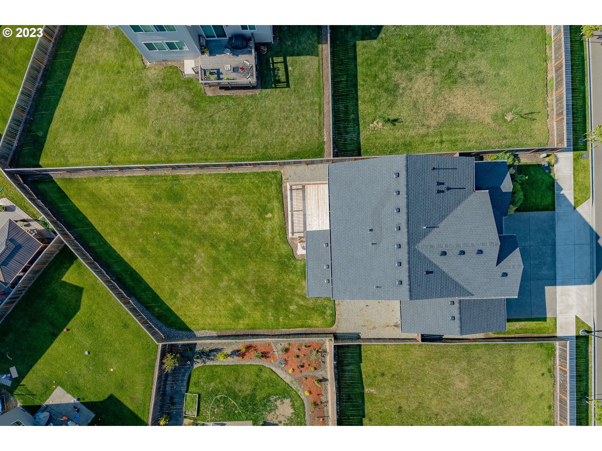 3825 South 39th Place Ridgefield, WA 98642 - Photo 29 of 37 an aerial view of a house with a yard