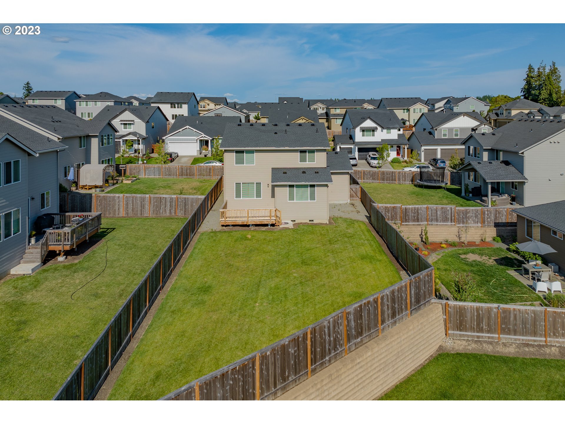 3825 South 39th Place Ridgefield, WA 98642 - Photo 30 of 37 a view of a swimming pool with a garden
