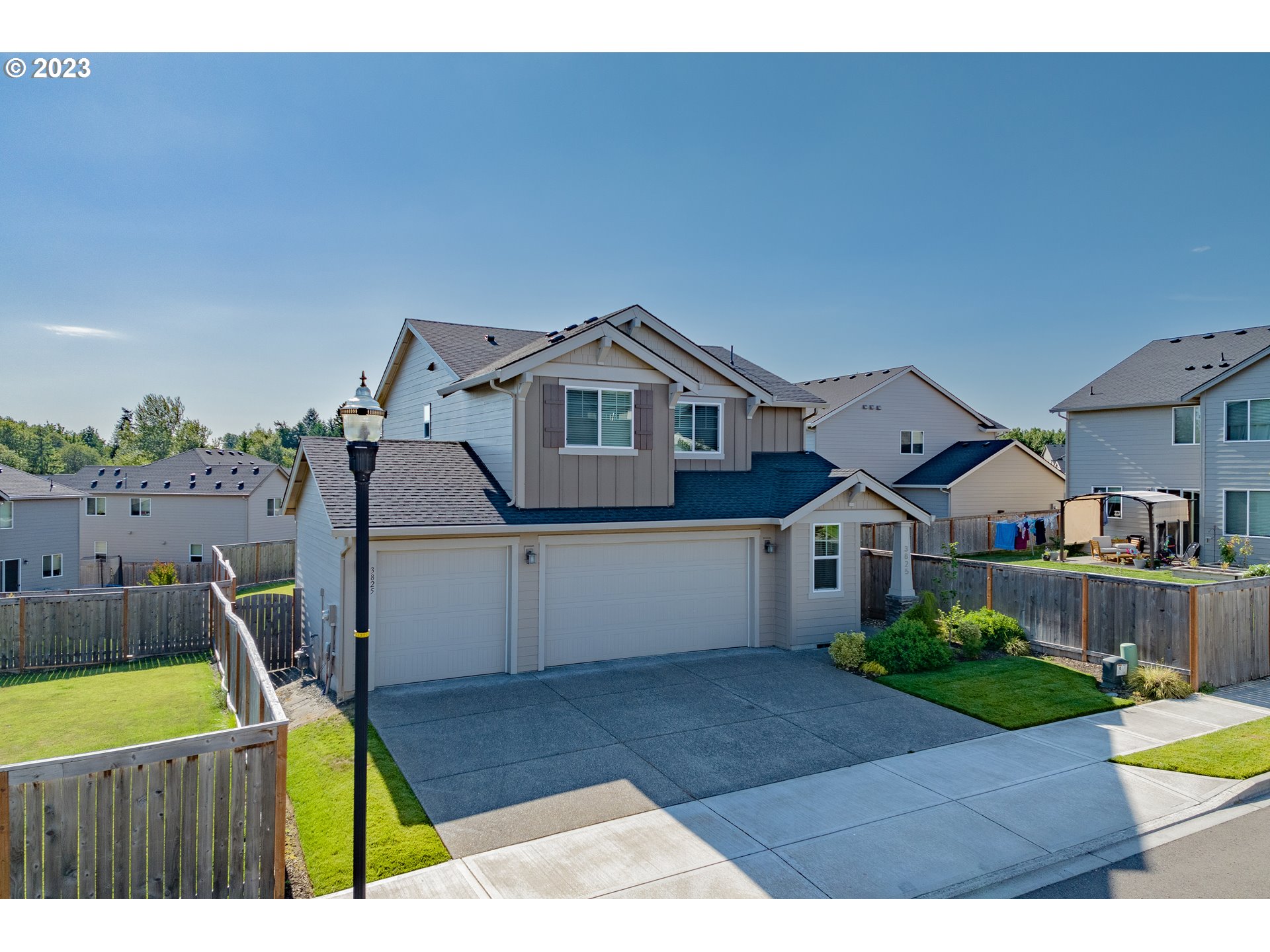 3825 South 39th Place Ridgefield, WA 98642 - Photo 3 of 37 a view of a house with a yard