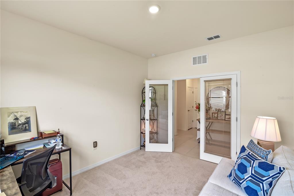6345 Southwest 88th Loop Ocala, FL 34476 - Photo 24 of 41 a livingroom with a workspace