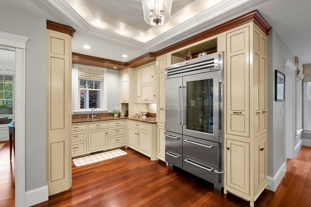 427 B Ipswich Road Boxford, MA 01921 - Photo 16 of 42 a kitchen with stainless steel appliances granite countertop a refrigerator and a stove top oven