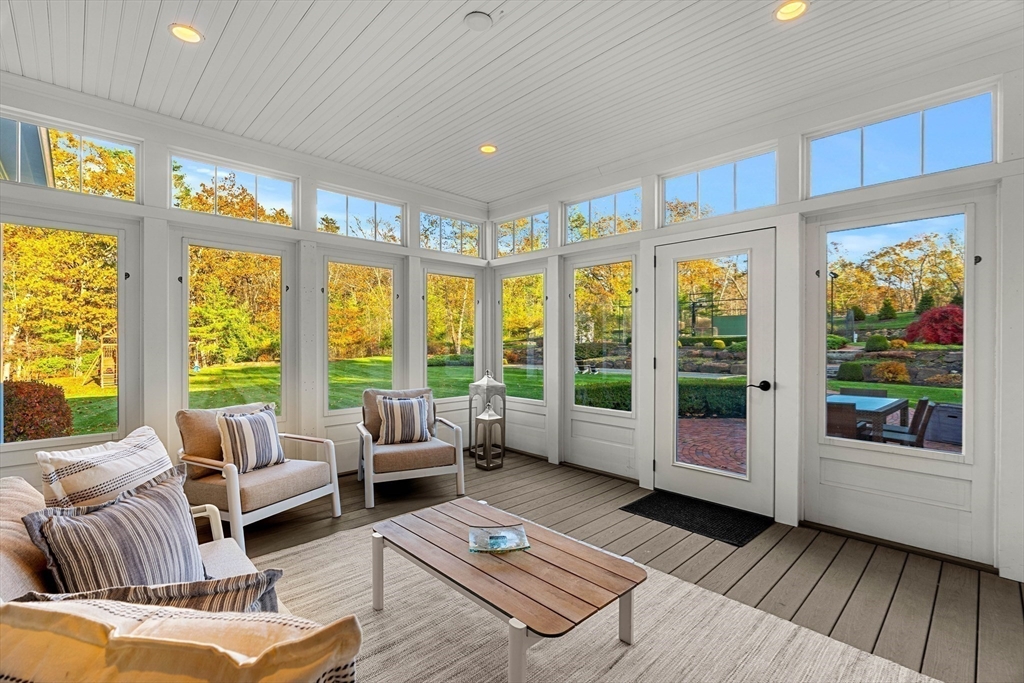 427 B Ipswich Road Boxford, MA 01921 - Photo 19 of 42 a living room with furniture and a large window
