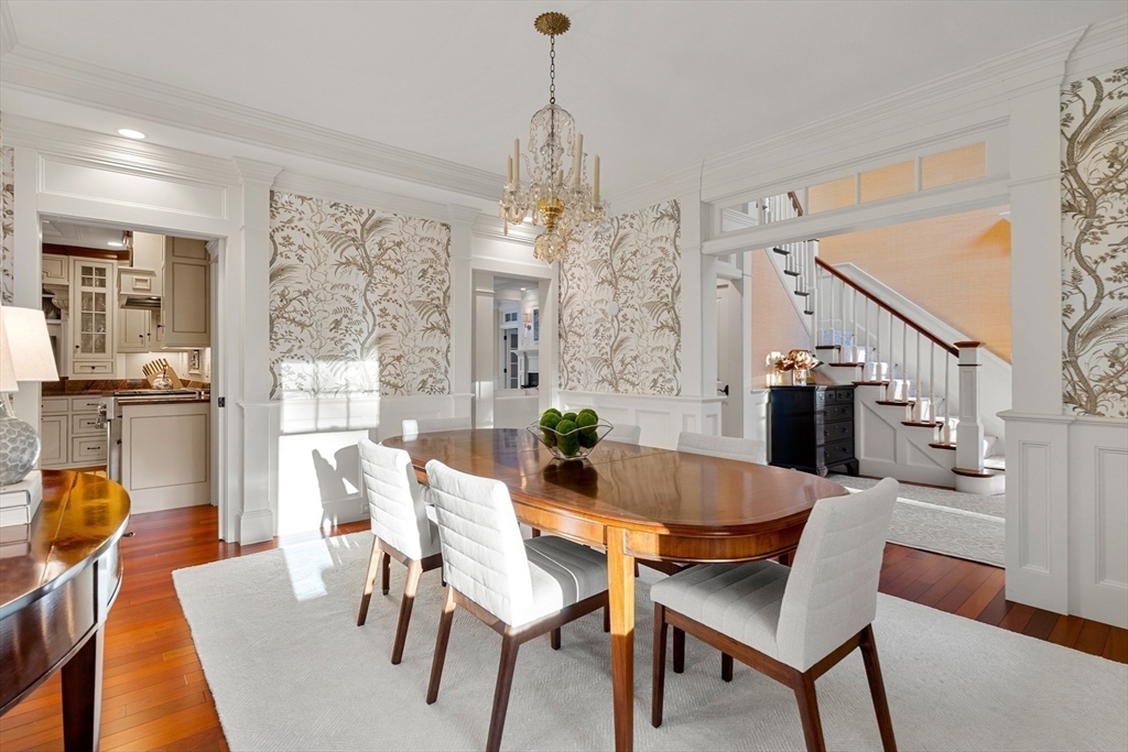 427 B Ipswich Road Boxford, MA 01921 - Photo 21 of 42 a dining room with furniture a chandelier and wooden floor