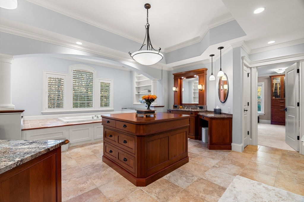 427 B Ipswich Road Boxford, MA 01921 - Photo 26 of 42 a living room with granite countertop furniture and a chandelier