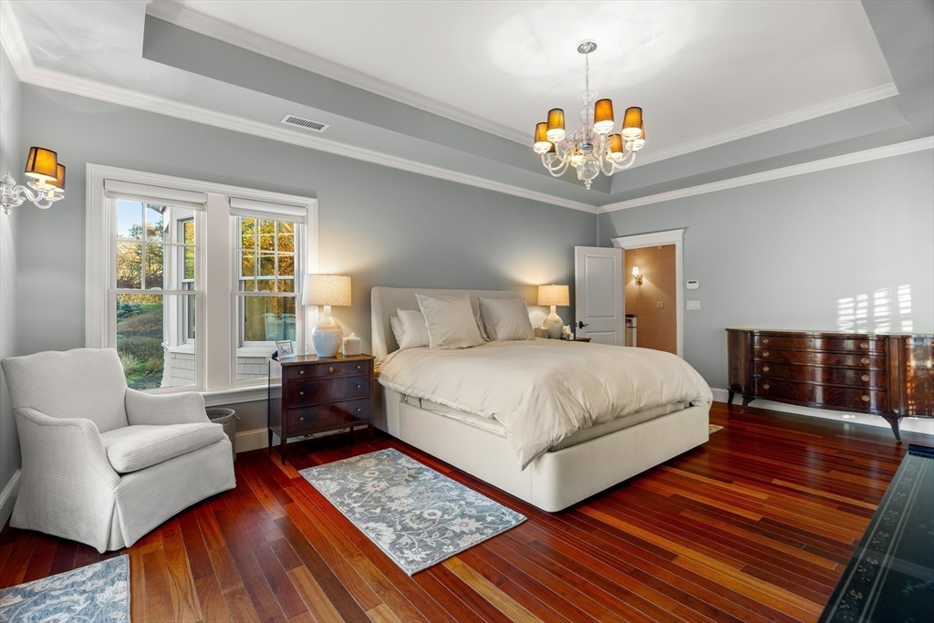 427 B Ipswich Road Boxford, MA 01921 - Photo 28 of 42 a bedroom with a bed and a couch