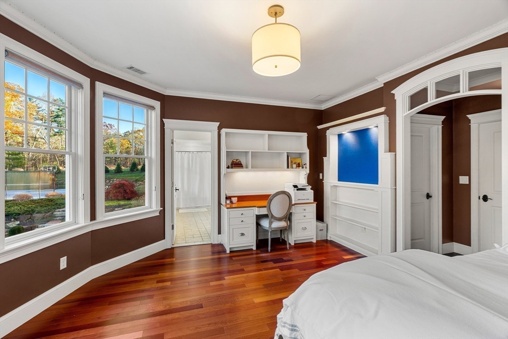 427 B Ipswich Road Boxford, MA 01921 - Photo 32 of 42 a bedroom with a bed and a large window with outer view