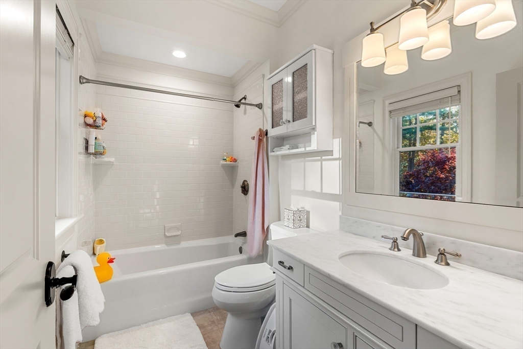 427 B Ipswich Road Boxford, MA 01921 - Photo 34 of 42 a bathroom with a sink a toilet and a bathtub