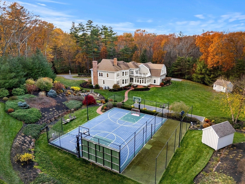 427 B Ipswich Road Boxford, MA 01921 - Photo 38 of 42 an aerial view of a house with a garden and large trees