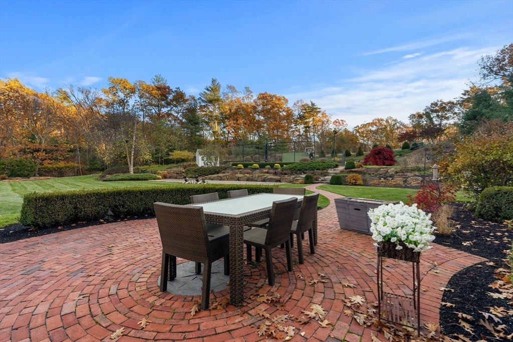 427 B Ipswich Road Boxford, MA 01921 - Photo 40 of 42 a view of a chairs and table in the patio
