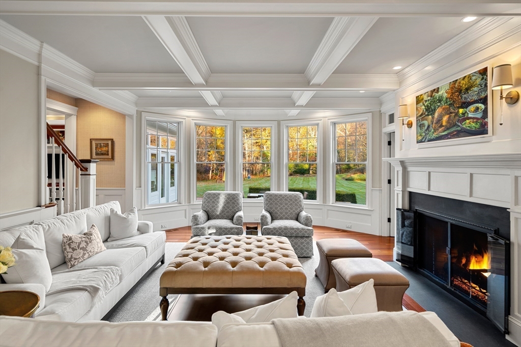 427 B Ipswich Road Boxford, MA 01921 - Photo 8 of 42 a living room with furniture and a fireplace
