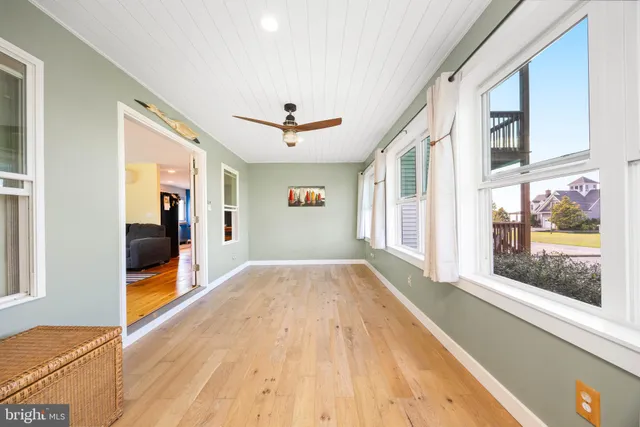 a view of empty room with windows