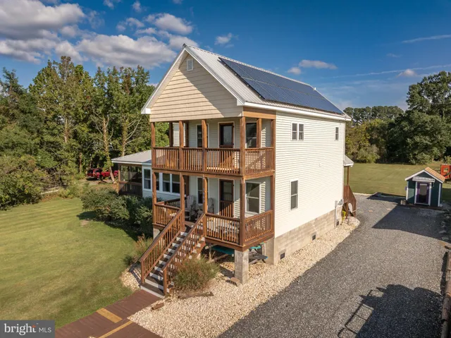 a view of an ocean house and outdoor space