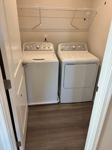 a utility room with dryer and washer