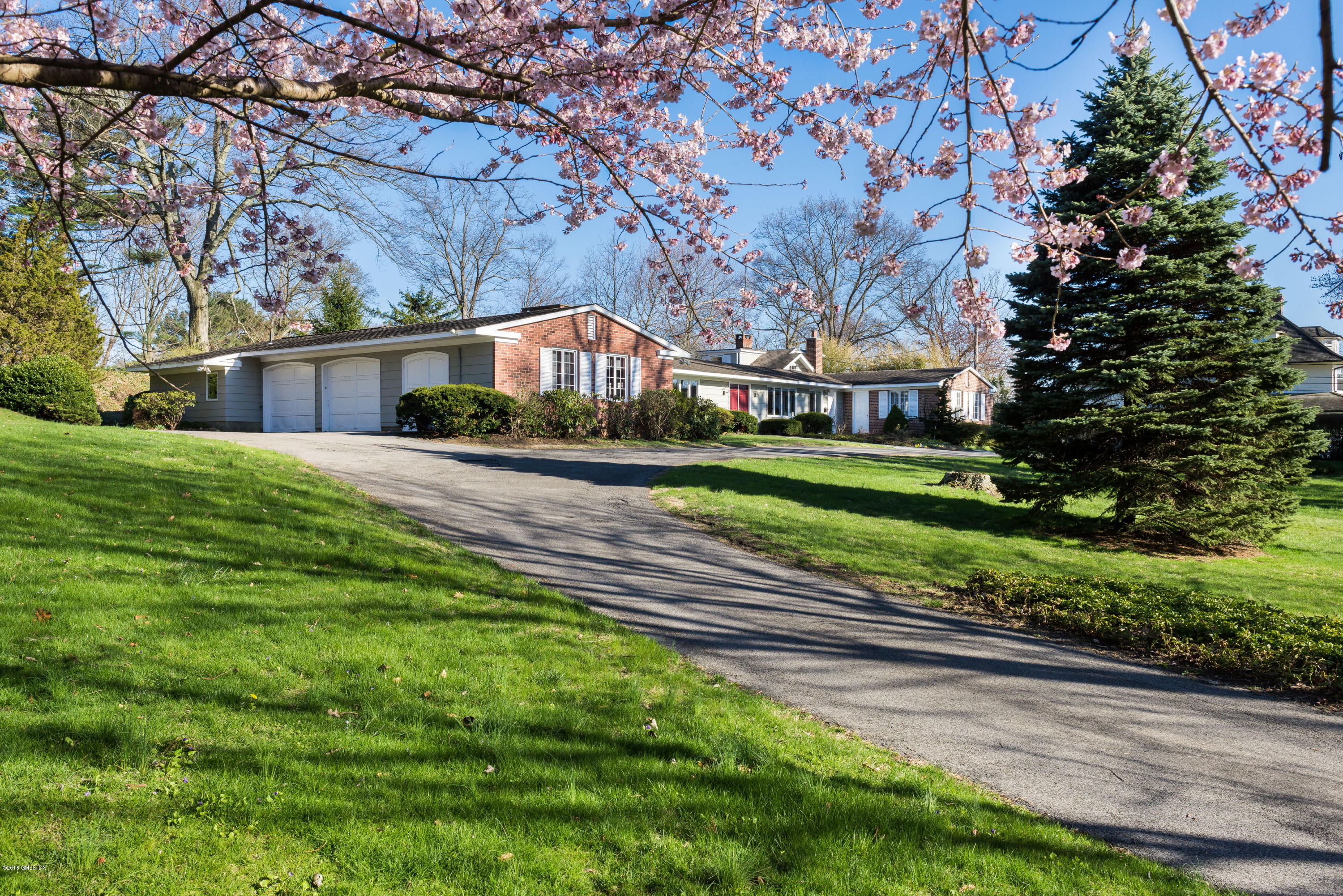 90 Club Road Riverside, CT 06878 - Photo 1 of 20 a front view of a house with a yard
