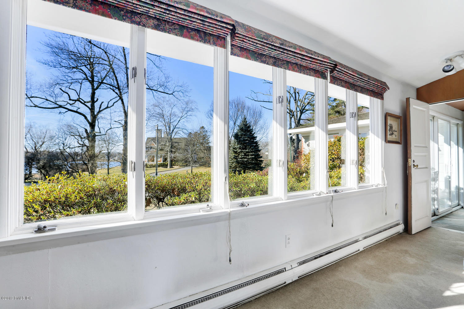 90 Club Road Riverside, CT 06878 - Photo 11 of 20 a view of a large window with an outdoor space