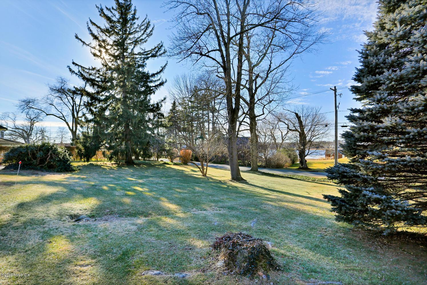 90 Club Road Riverside, CT 06878 - Photo 18 of 20 a view of a park with large trees