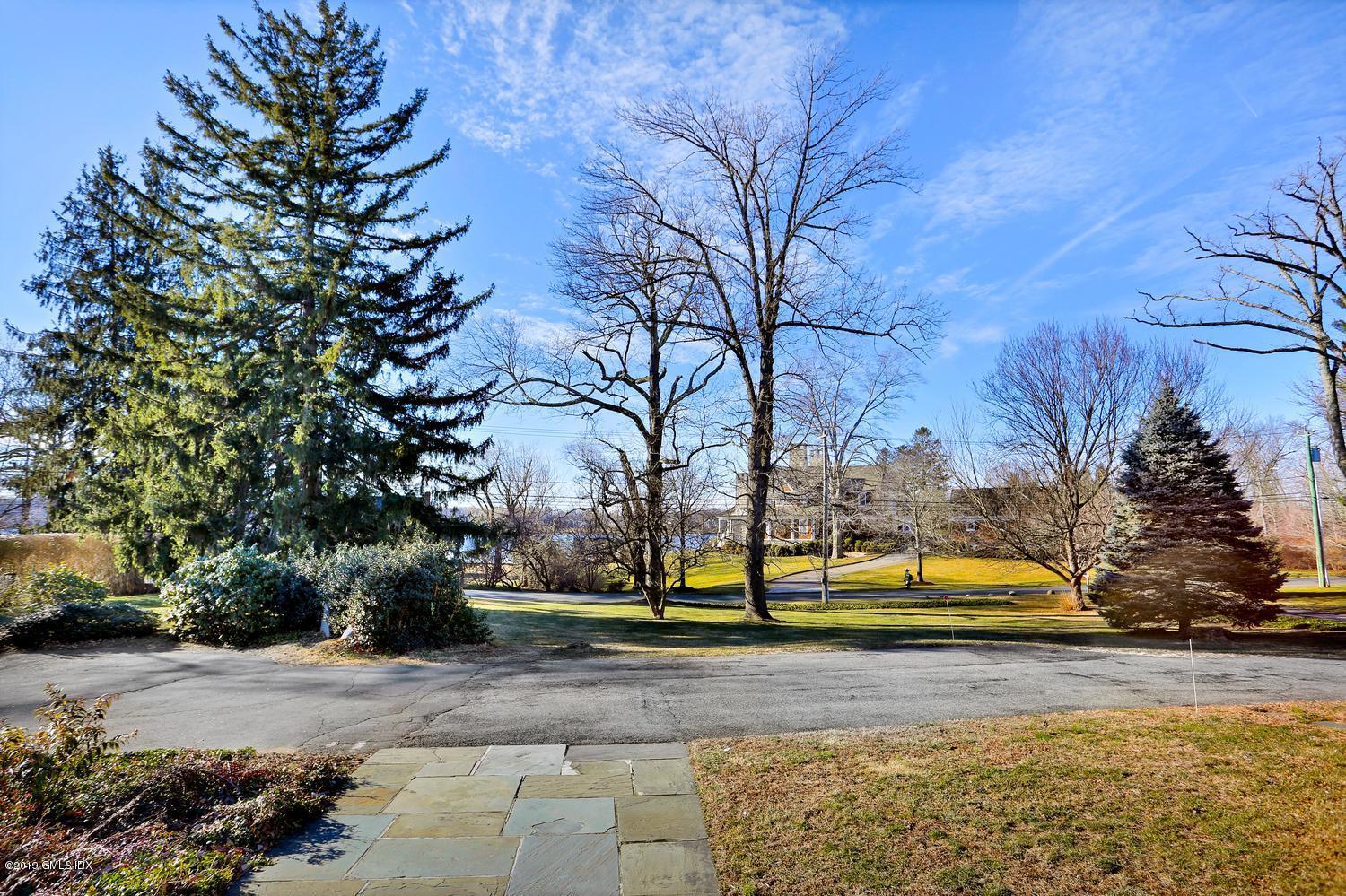 90 Club Road Riverside, CT 06878 - Photo 19 of 20 a view of a yard with large trees