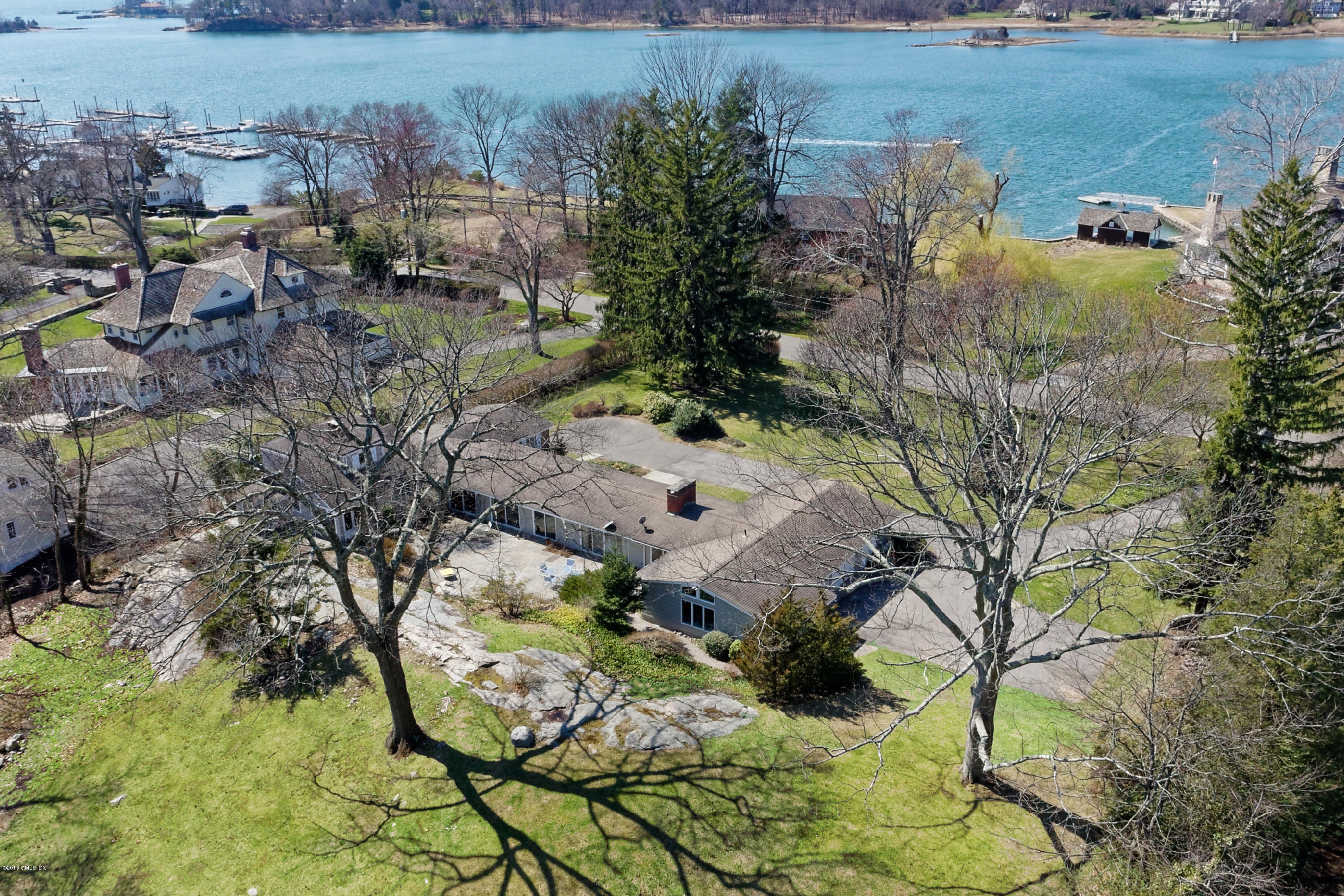 90 Club Road Riverside, CT 06878 - Photo 4 of 20 a aerial view of a house with a yard