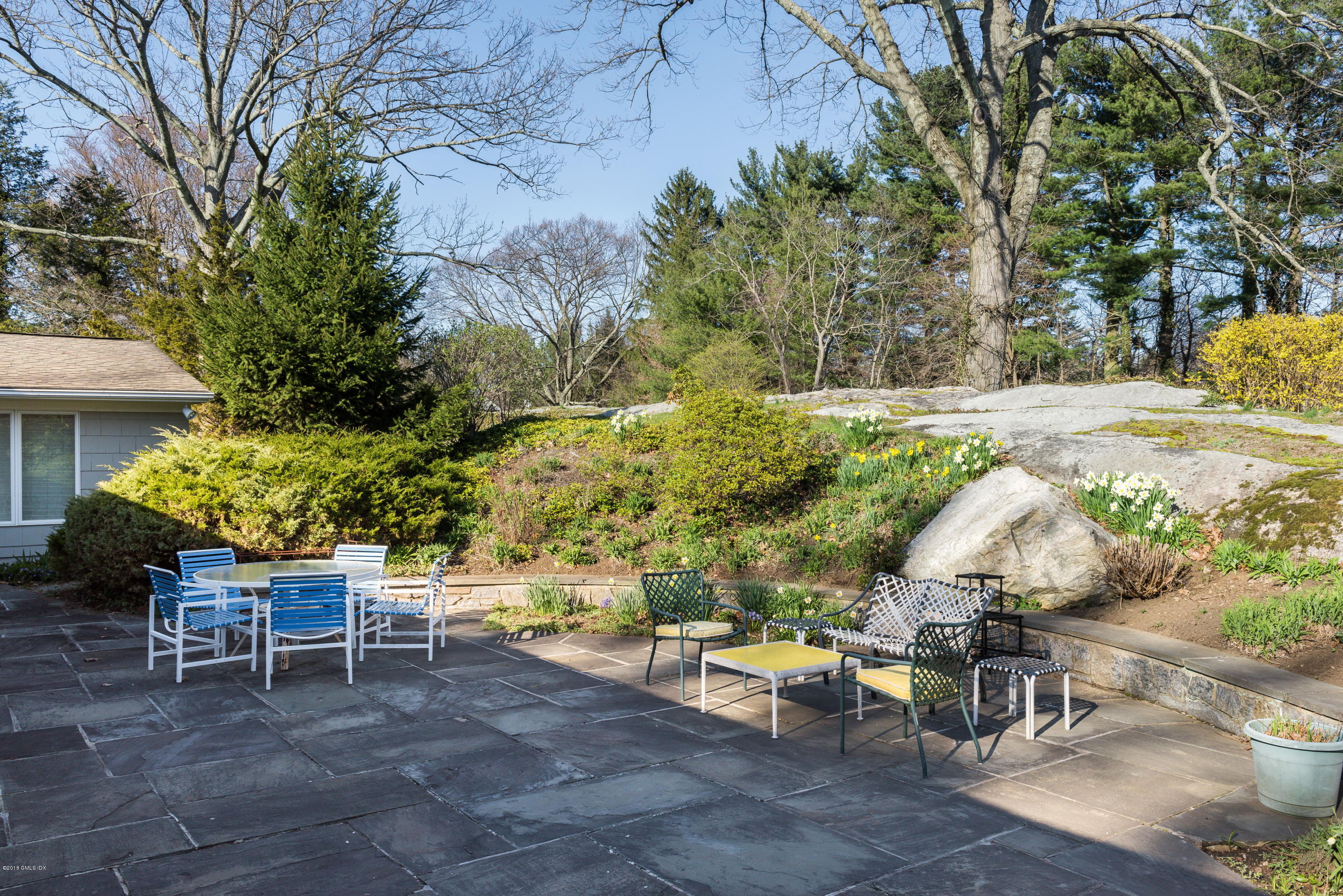 90 Club Road Riverside, CT 06878 - Photo 7 of 20 a view of a chairs and table in backyard