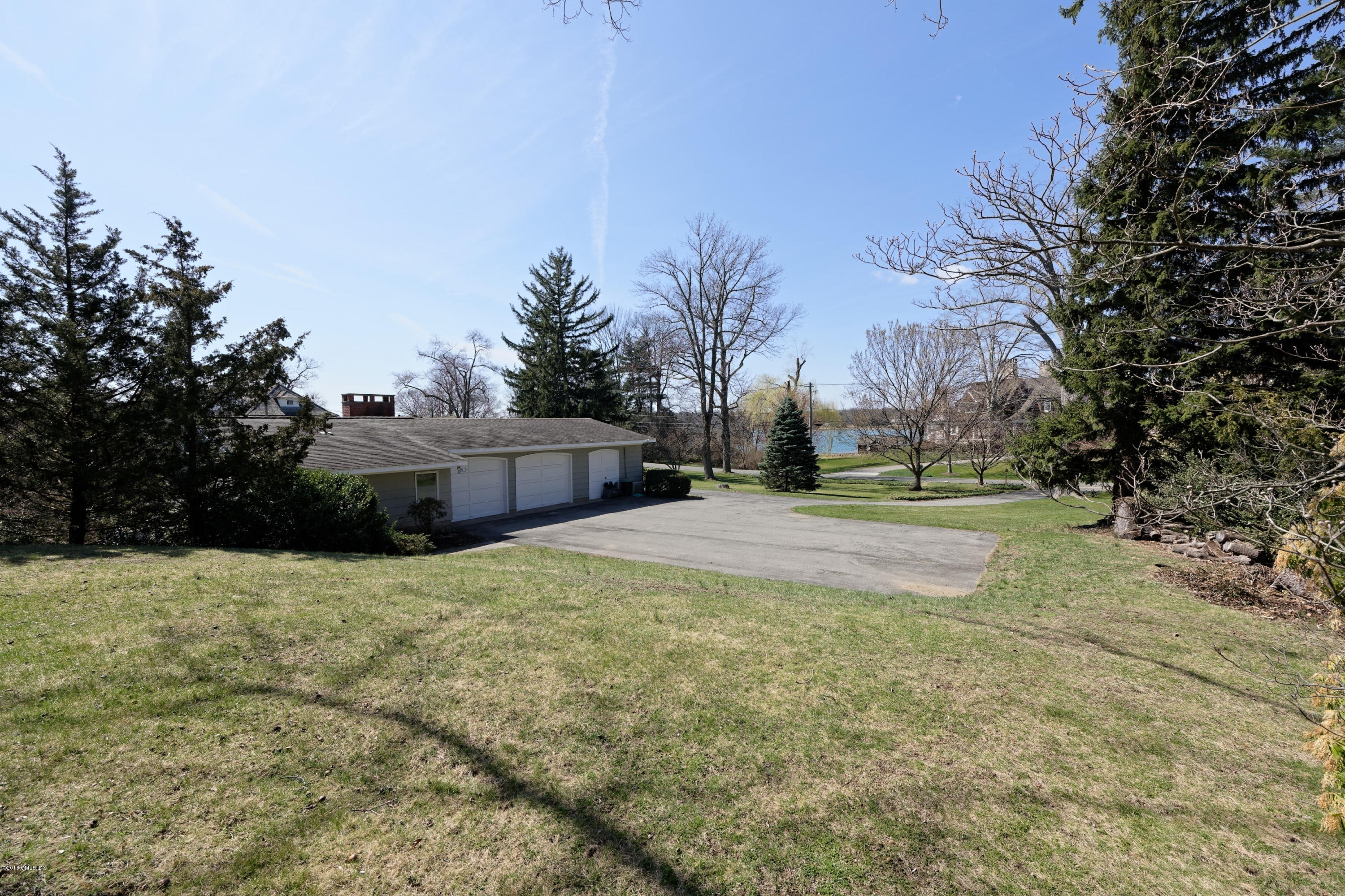 90 Club Road Riverside, CT 06878 - Photo 8 of 20 a view of back yard of the house
