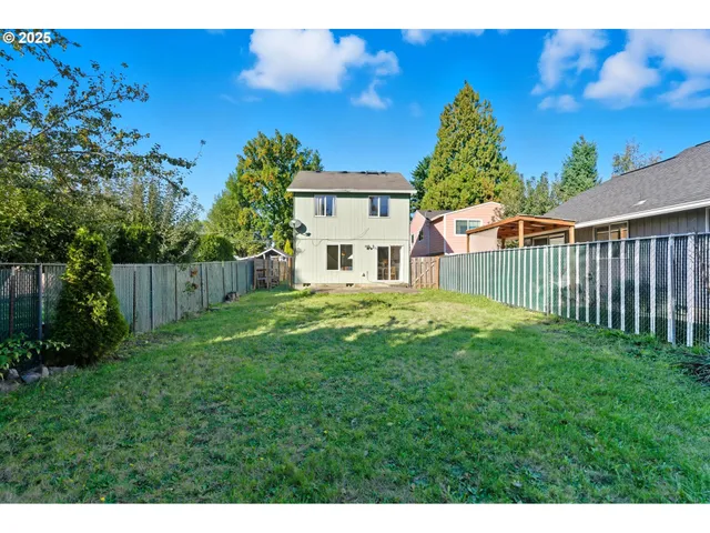 a house view with a garden