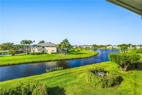 a view of lake with houses with outdoor space