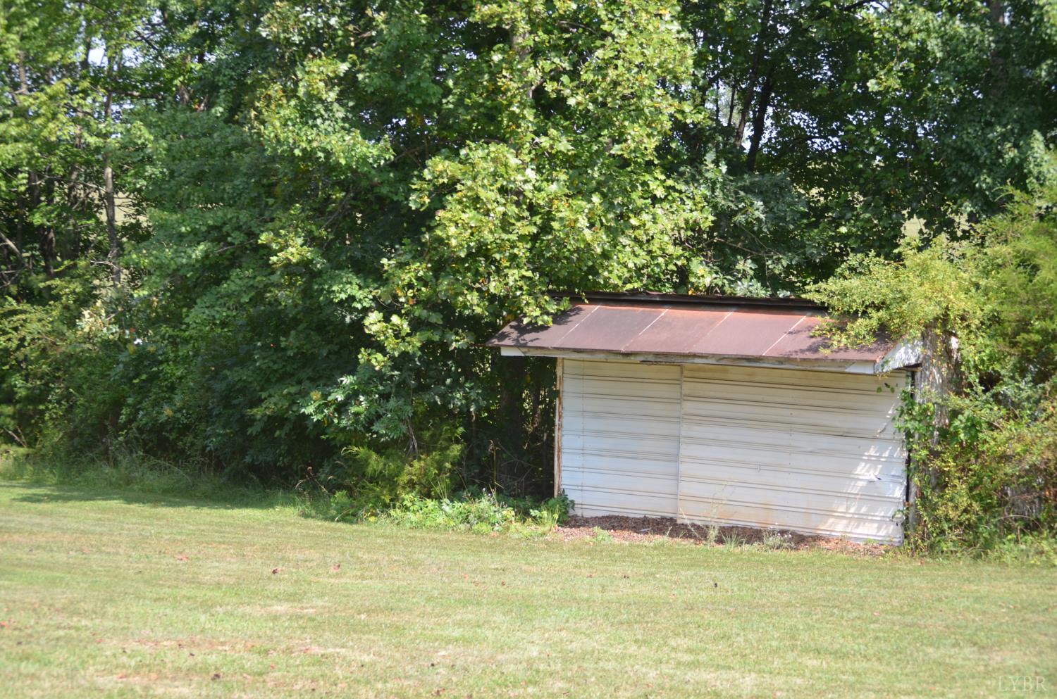 1953 Wards Road Hurt, VA 24563 - Photo 40 of 50 a front view of a house with a garden