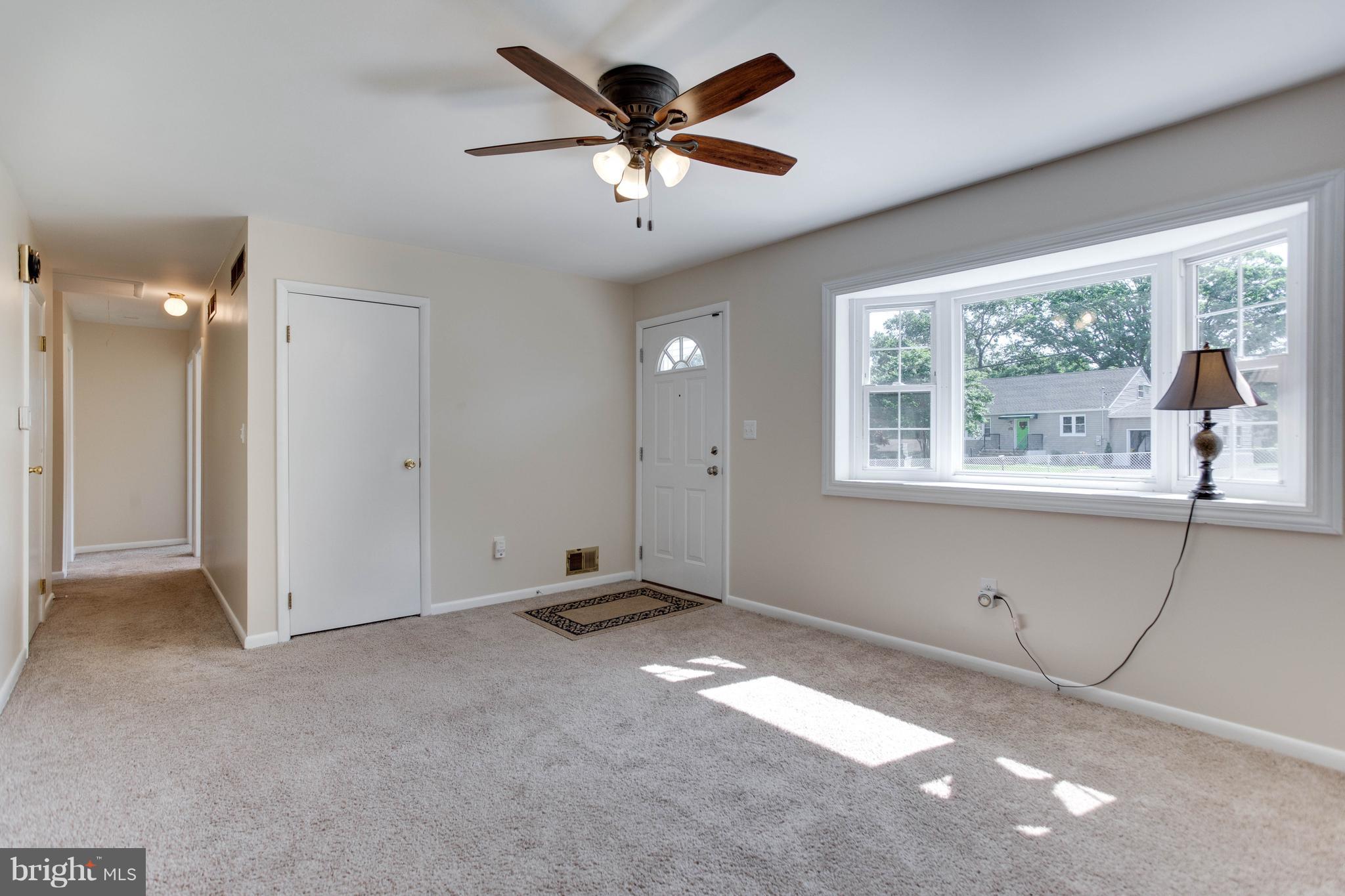 7928 Elizabeth Road Pasadena, MD 21122 - Photo 5 of 28 Living Room