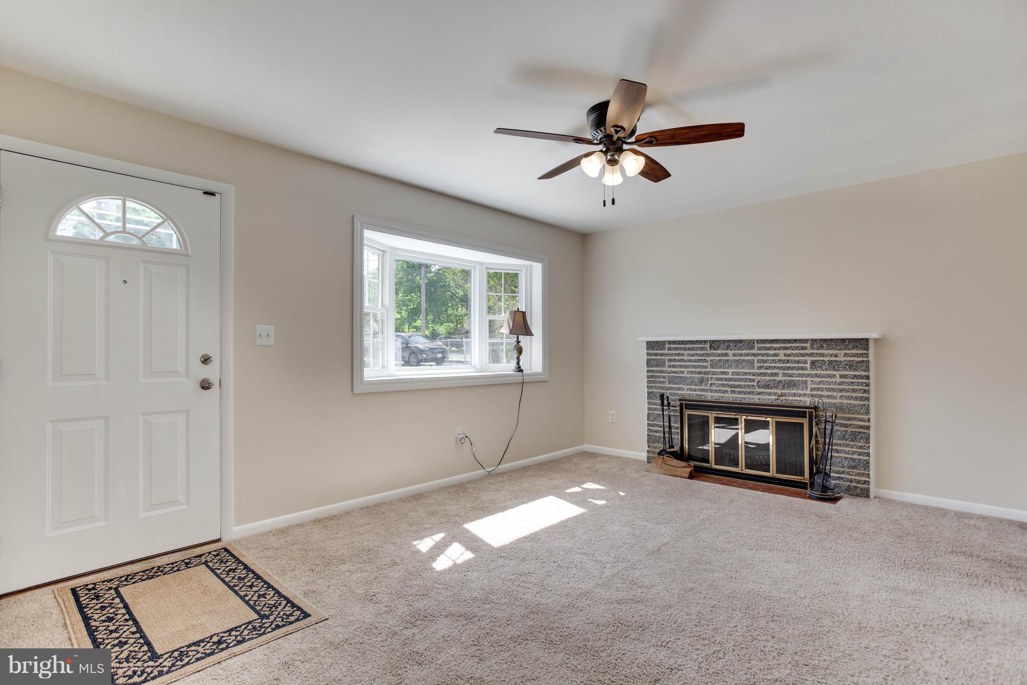 7928 Elizabeth Road Pasadena, MD 21122 - Photo 7 of 28 Living Room