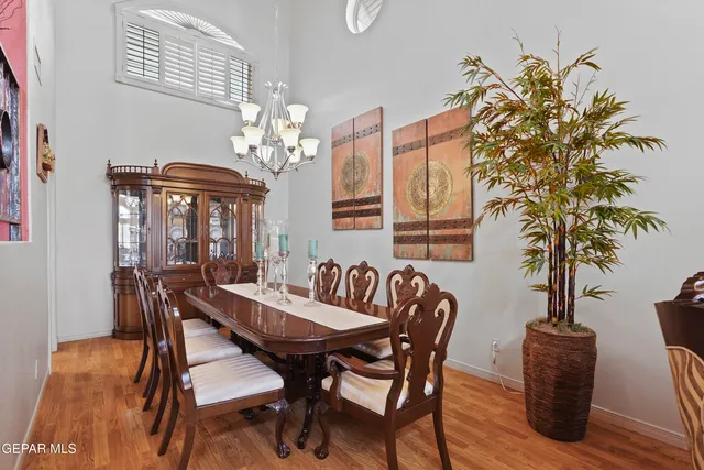 a view of a dining room with furniture and window