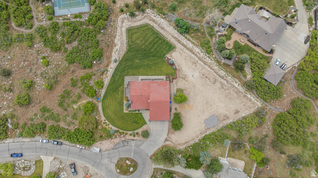4221 Juniper Circle Alpine, UT 84004 - Photo 56 of 66 Property featuring a red-roofed residence, a manicured lawn area, and extensive natural landscaping
