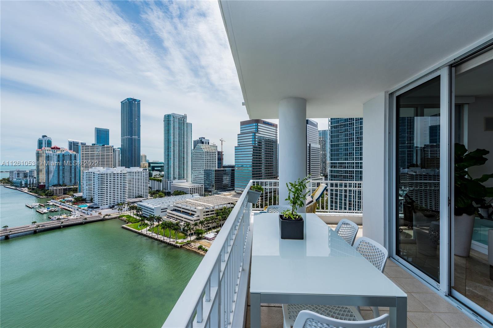 801 Brickell Key Boulevard, Unit 2401 Miami, FL 33131 - Photo 17 of 35 a view of a living room and dining room