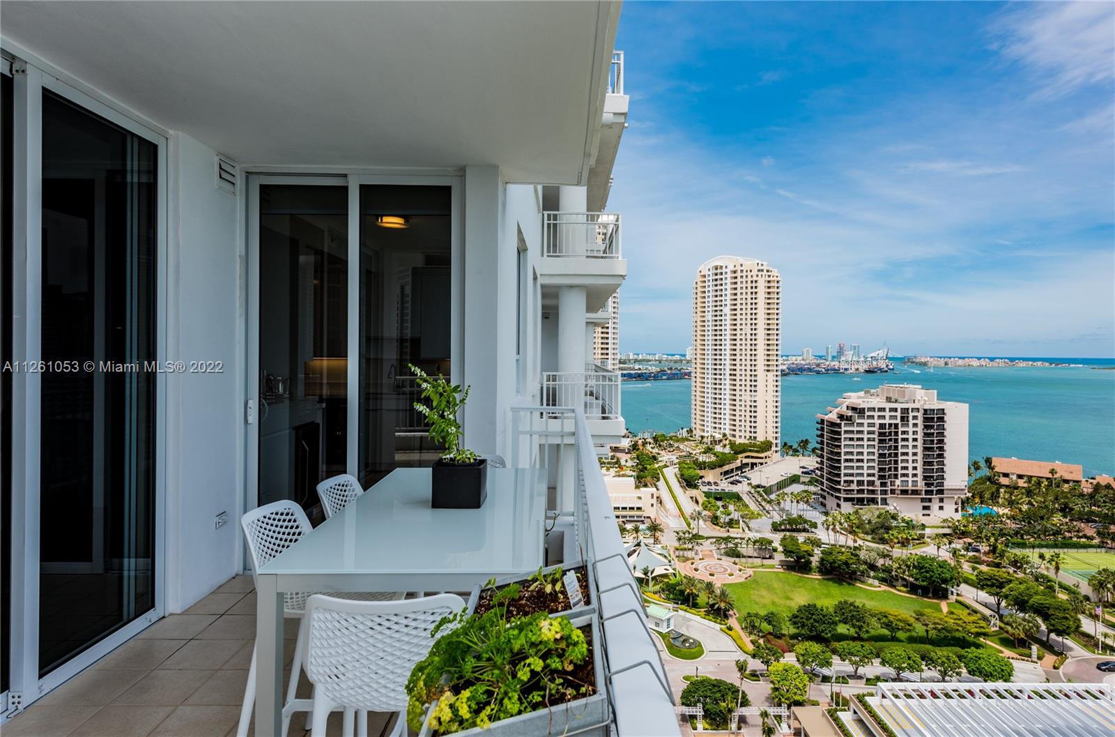 801 Brickell Key Boulevard, Unit 2401 Miami, FL 33131 - Photo 18 of 35 a city view with tall buildings